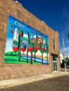 a large mural on the side of a building